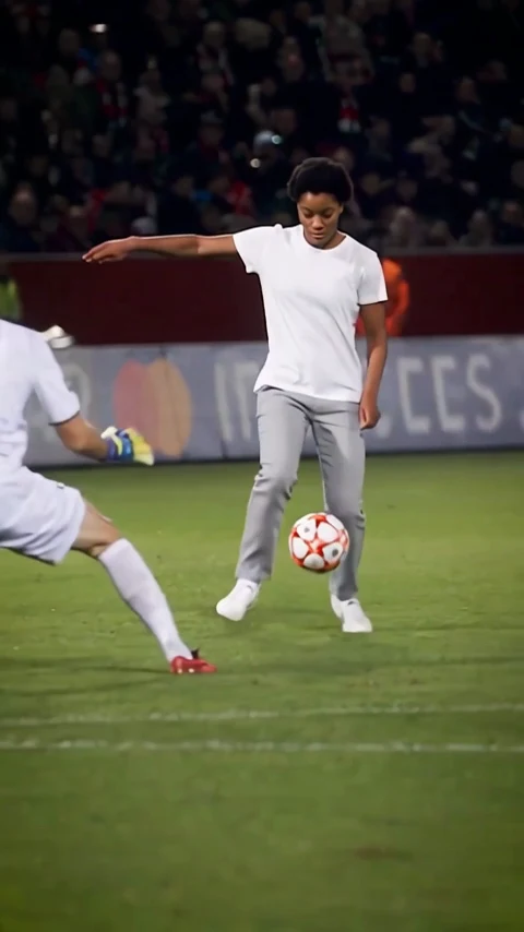 Frame from the finished Ozil Goal AI: Woman in a White T-Shirt video